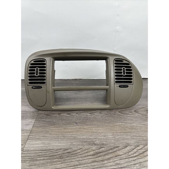 1997-2003 FORD F150 Expedition Tan Dash Radio Bezel‎ 1L14-7804302-CAW - Picture 1 of 6